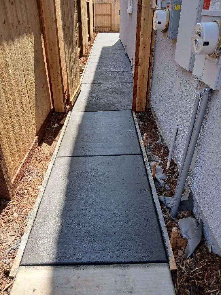 Pressler Home Performance concrete & landscaping project: Side Yard Concrete Walkway Installation in Rocklin, CA
