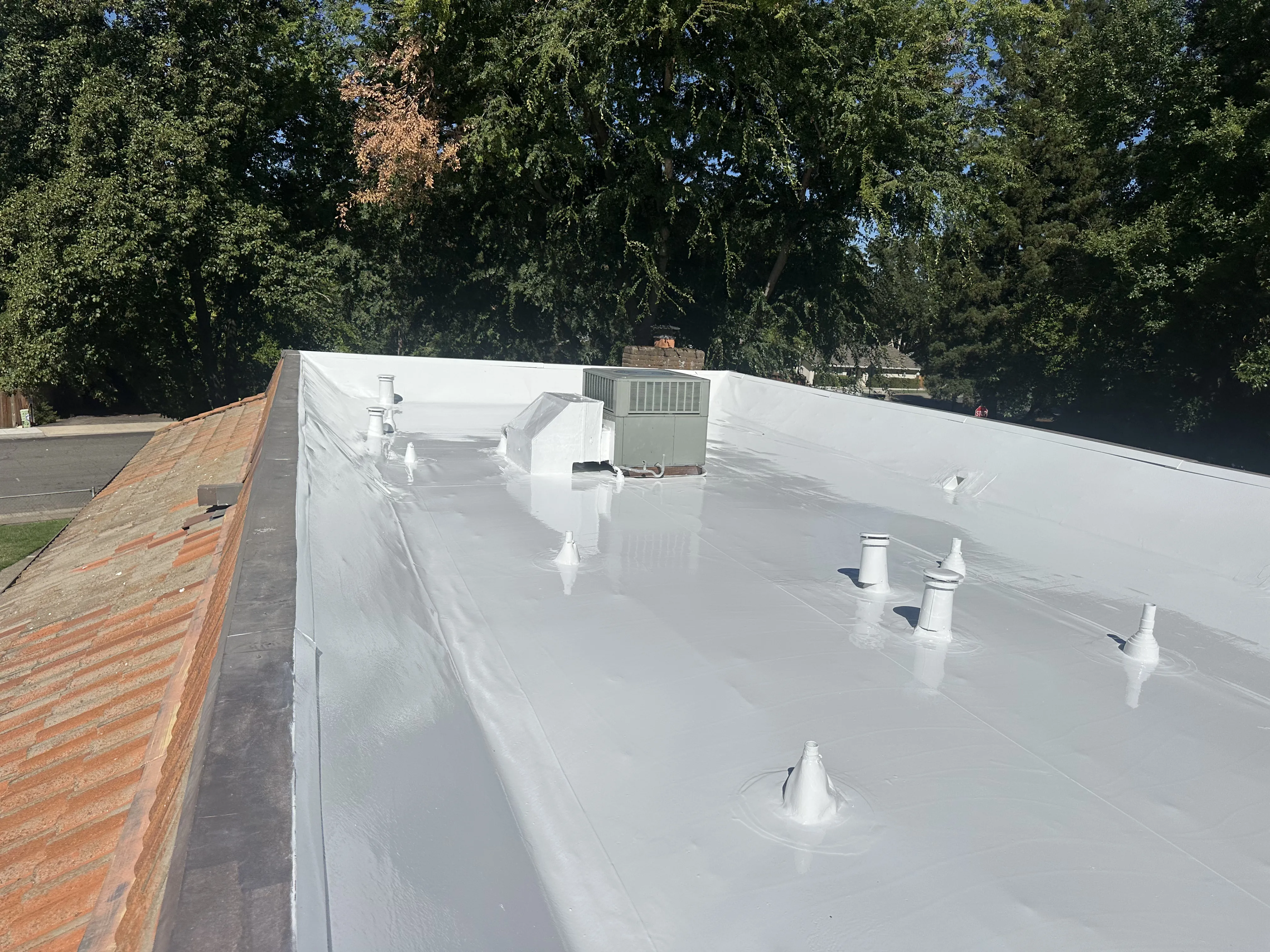Pressler Home Performance roofing project: Cool Roof Coating Installation on Flat Roof in Roseville, CA
