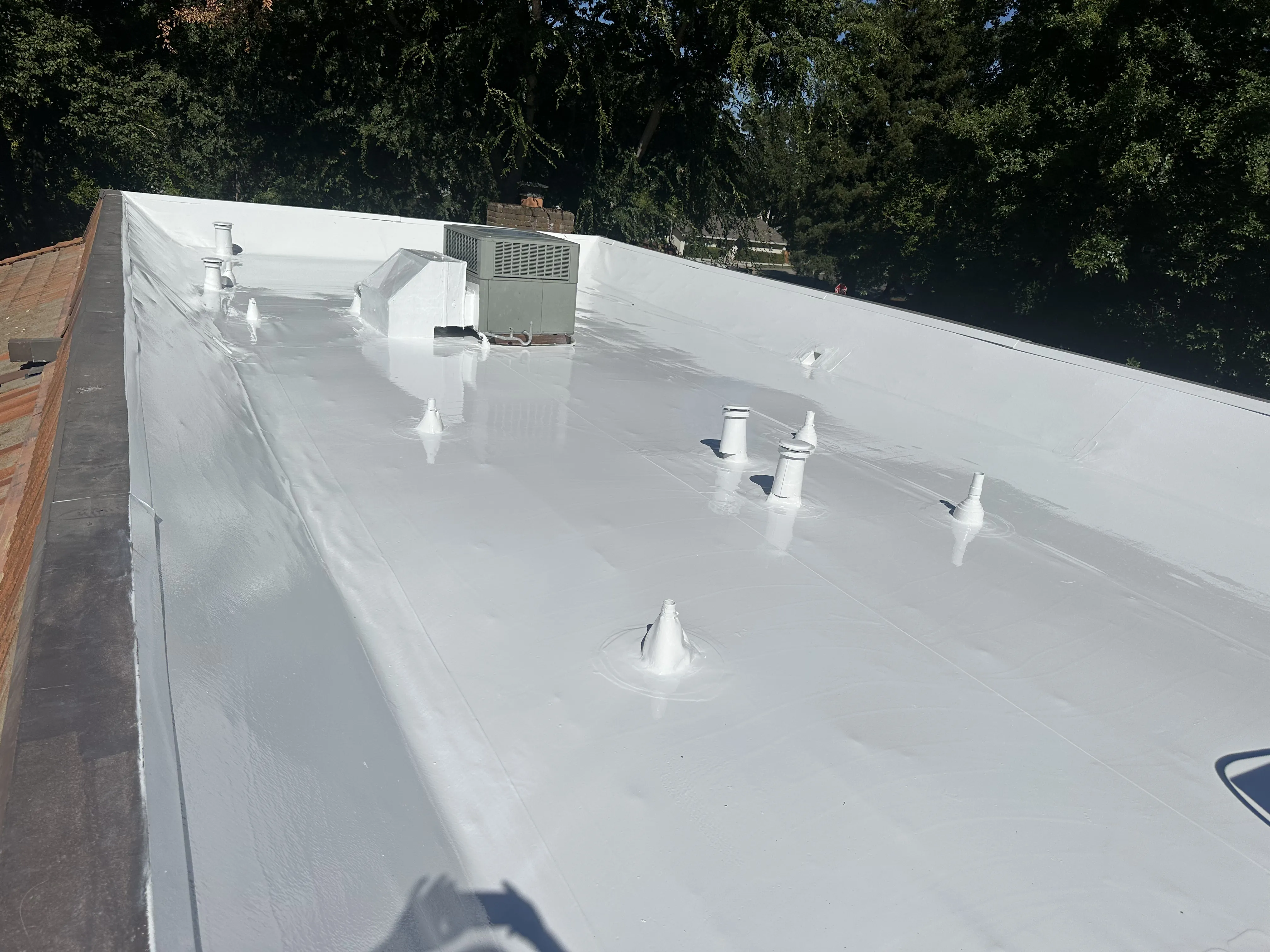 Pressler Home Performance roofing project: Cool Roof Coating Installation on Flat Roof in Roseville, CA