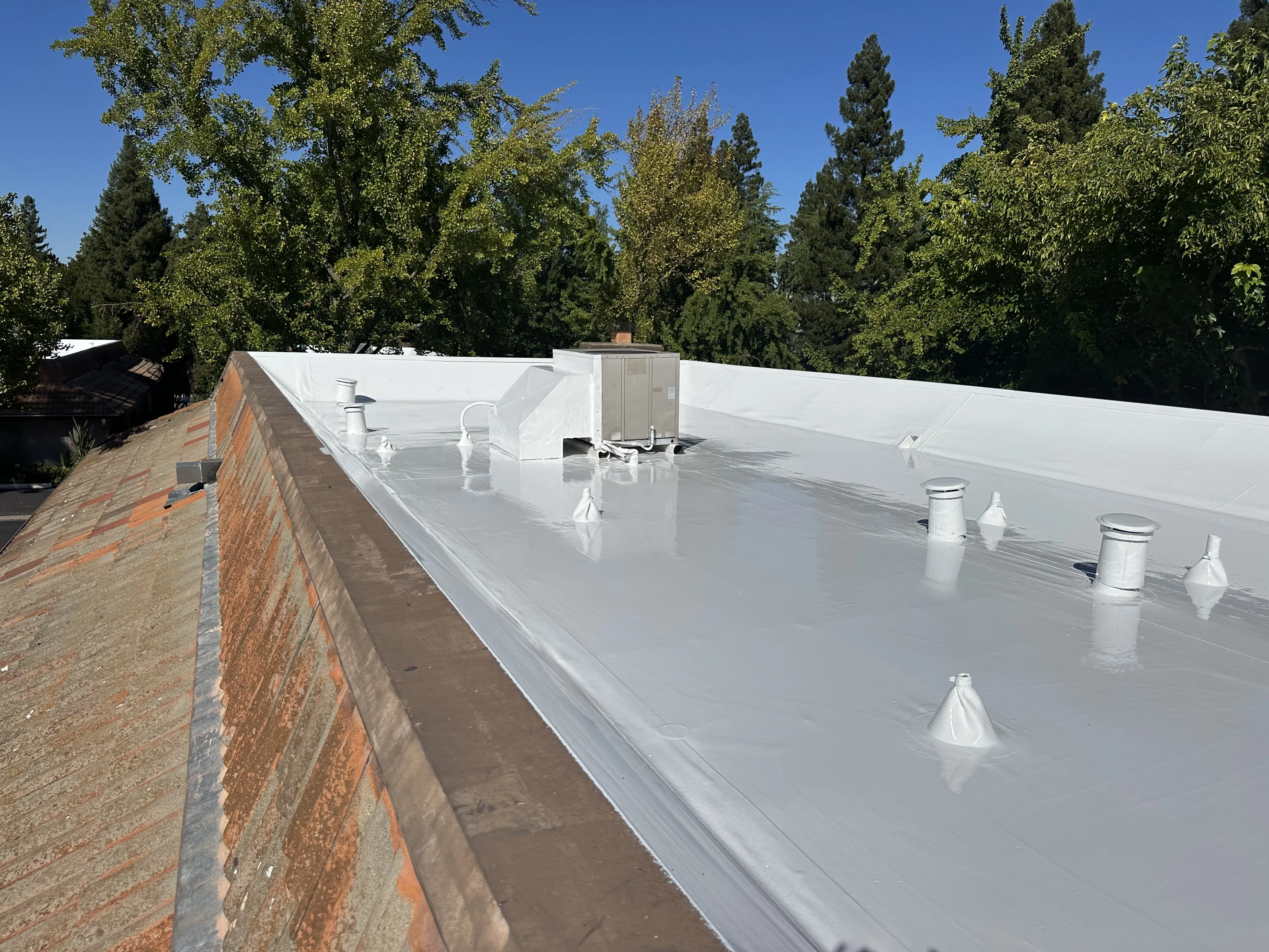 Pressler Home Performance roofing project: Cool Roof Coating Installation on Flat Roof in Roseville, CA