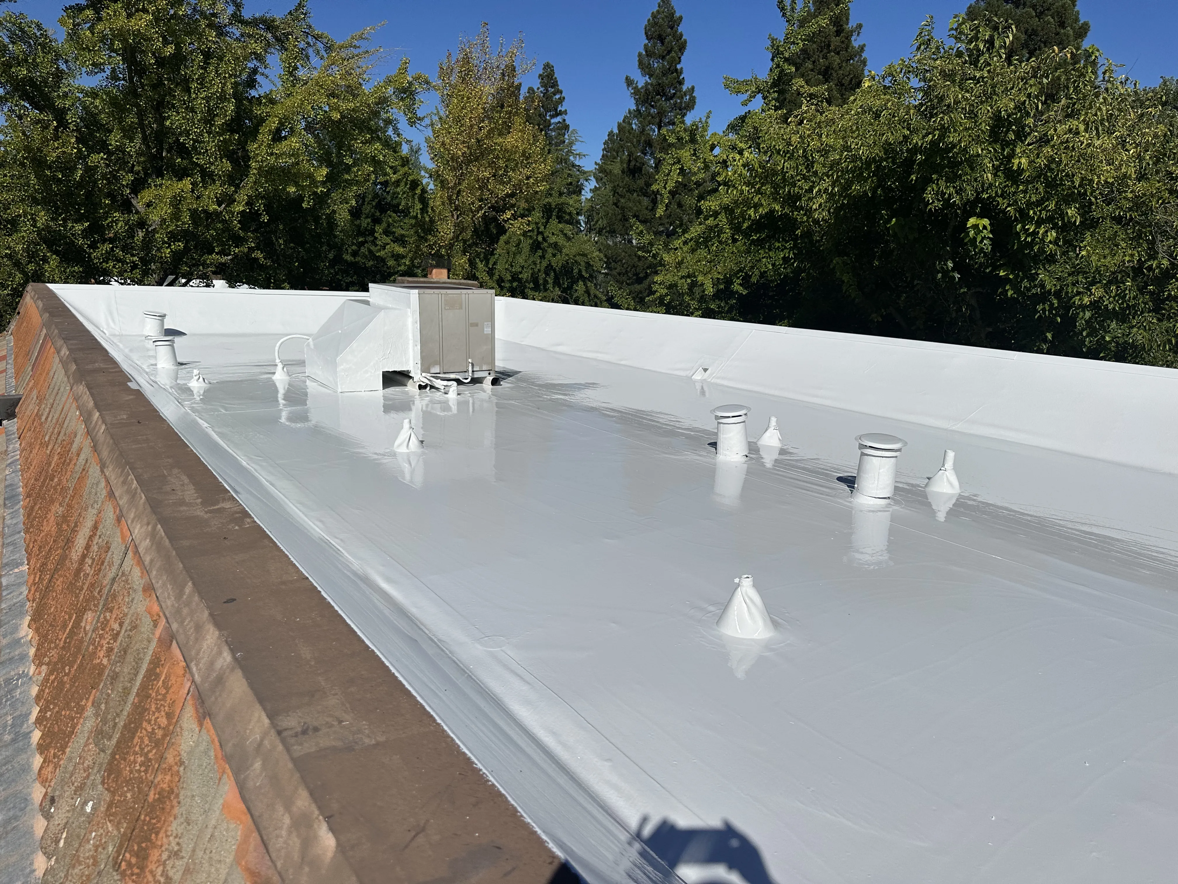 Pressler Home Performance roofing project: Cool Roof Coating Installation on Flat Roof in Roseville, CA