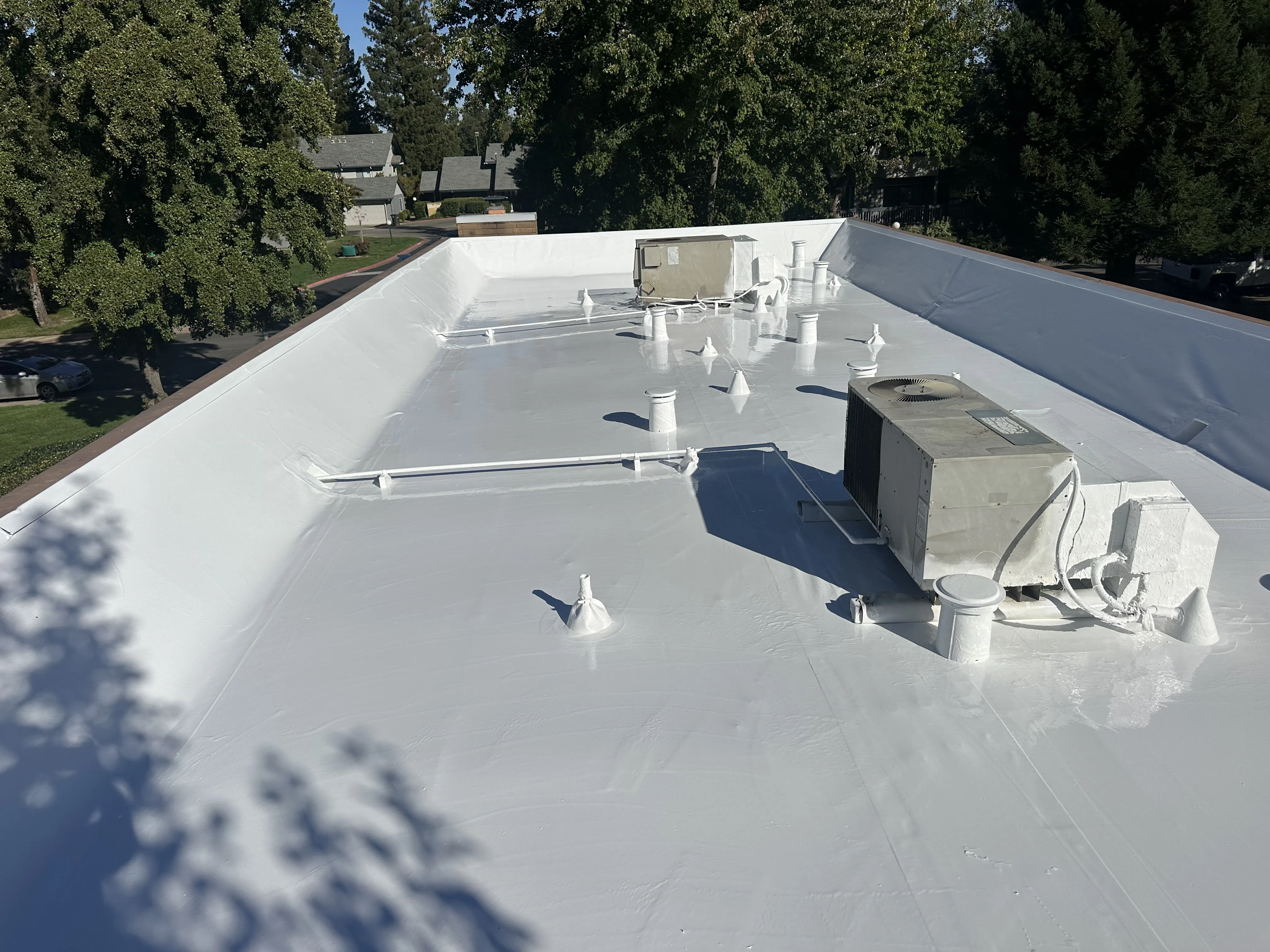 Pressler Home Performance roofing project: Cool Roof Coating Installation on Flat Roof in Roseville, CA