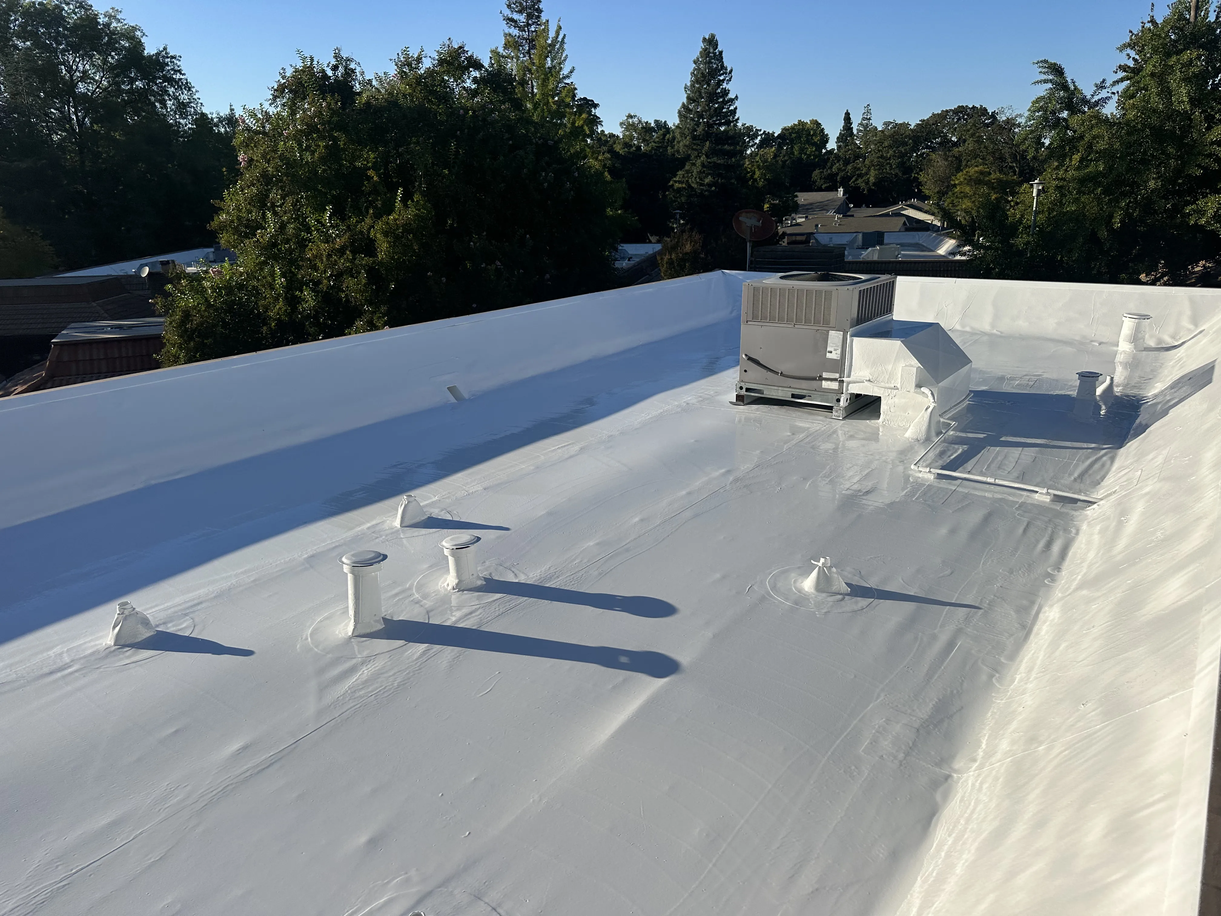 Pressler Home Performance roofing project: Cool Roof Coating Installation on Flat Roof in Roseville, CA