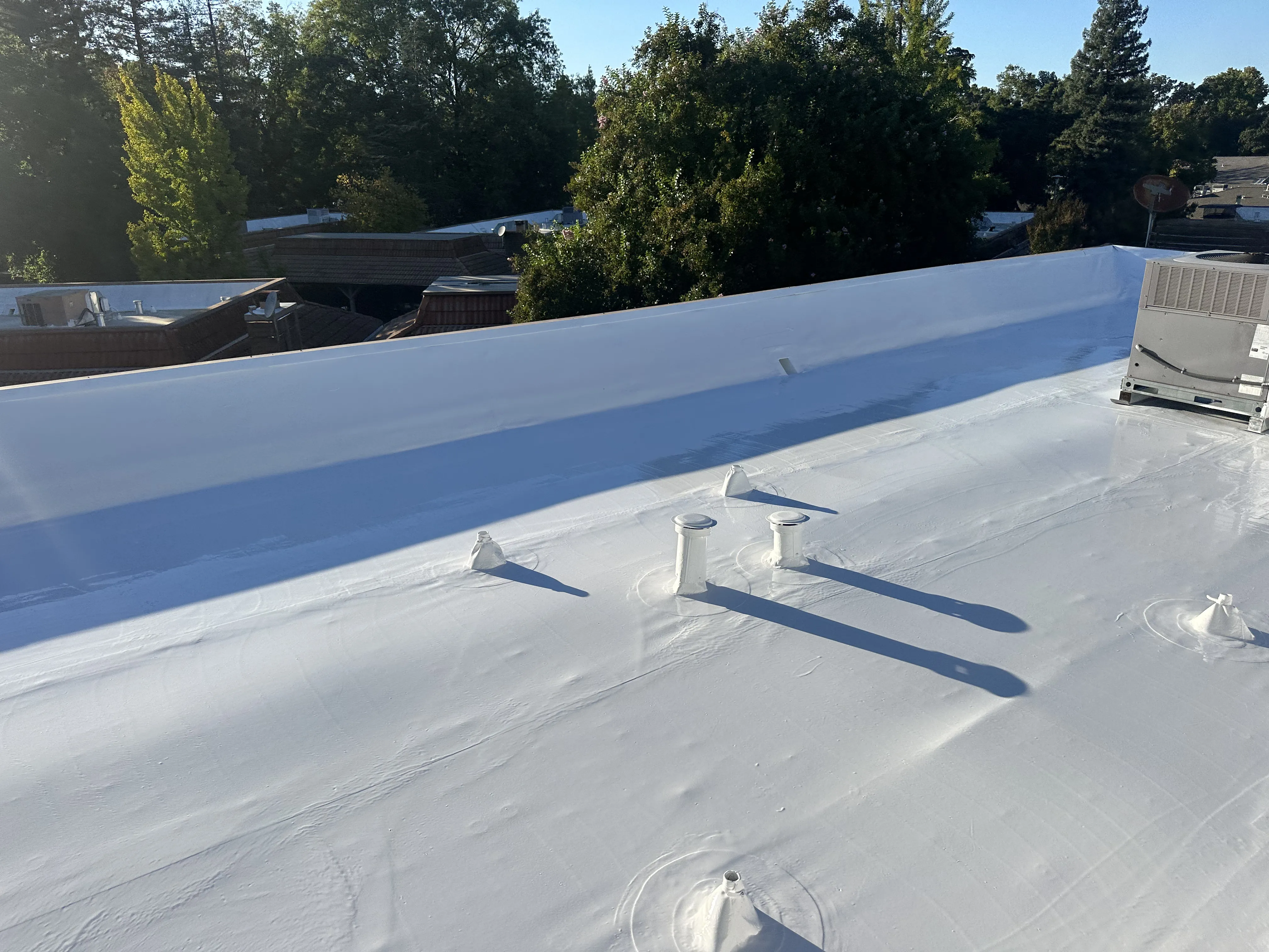 Pressler Home Performance roofing project: Cool Roof Coating Installation on Flat Roof in Roseville, CA