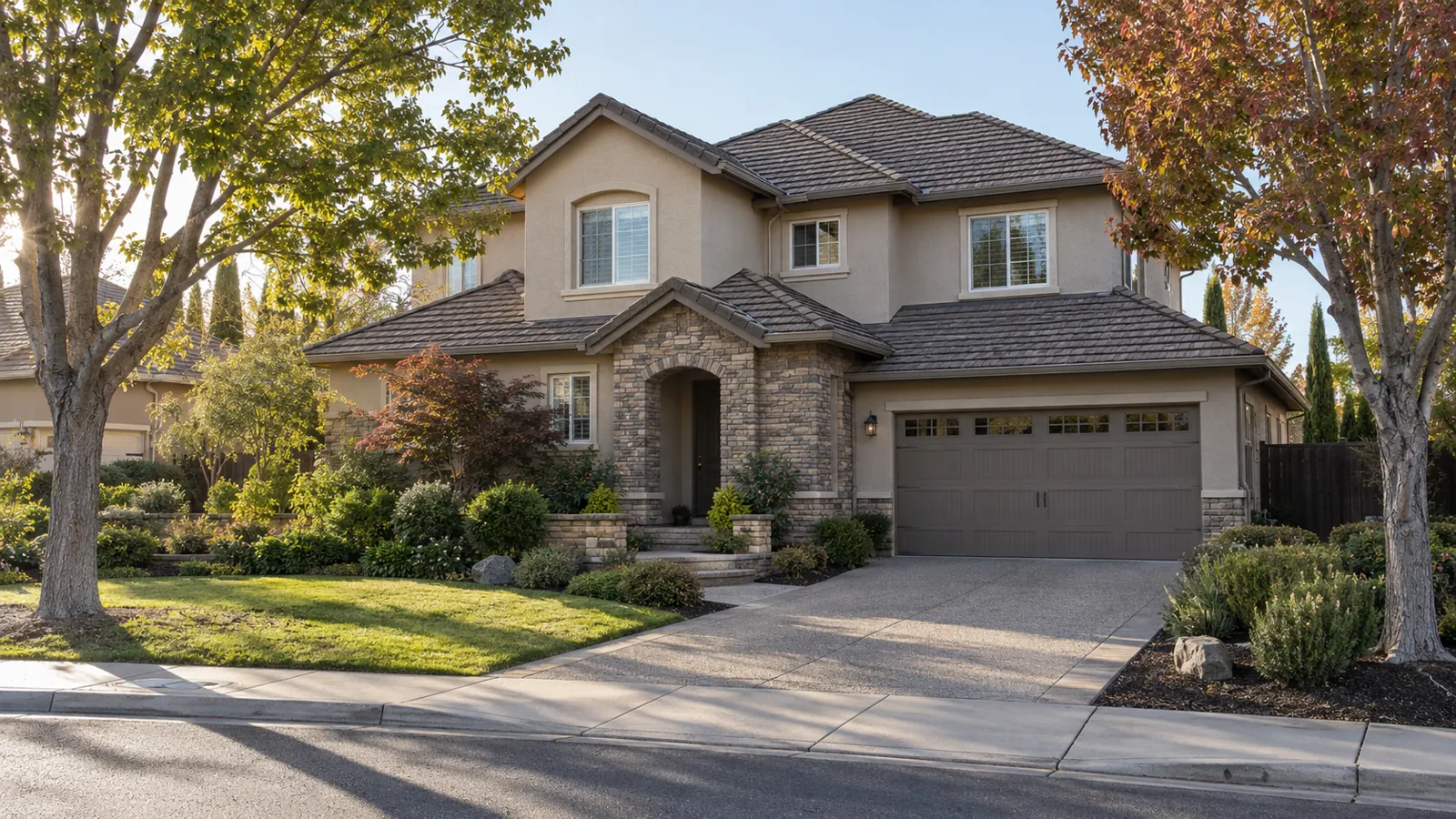 Illustrative two-story suburban home with a stone-coated steel shingle roof in a Roseville style neighborhood